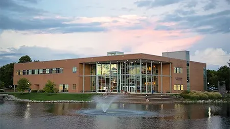 Center for Biblical and Theological Studies and Cedar Lake at sunset.